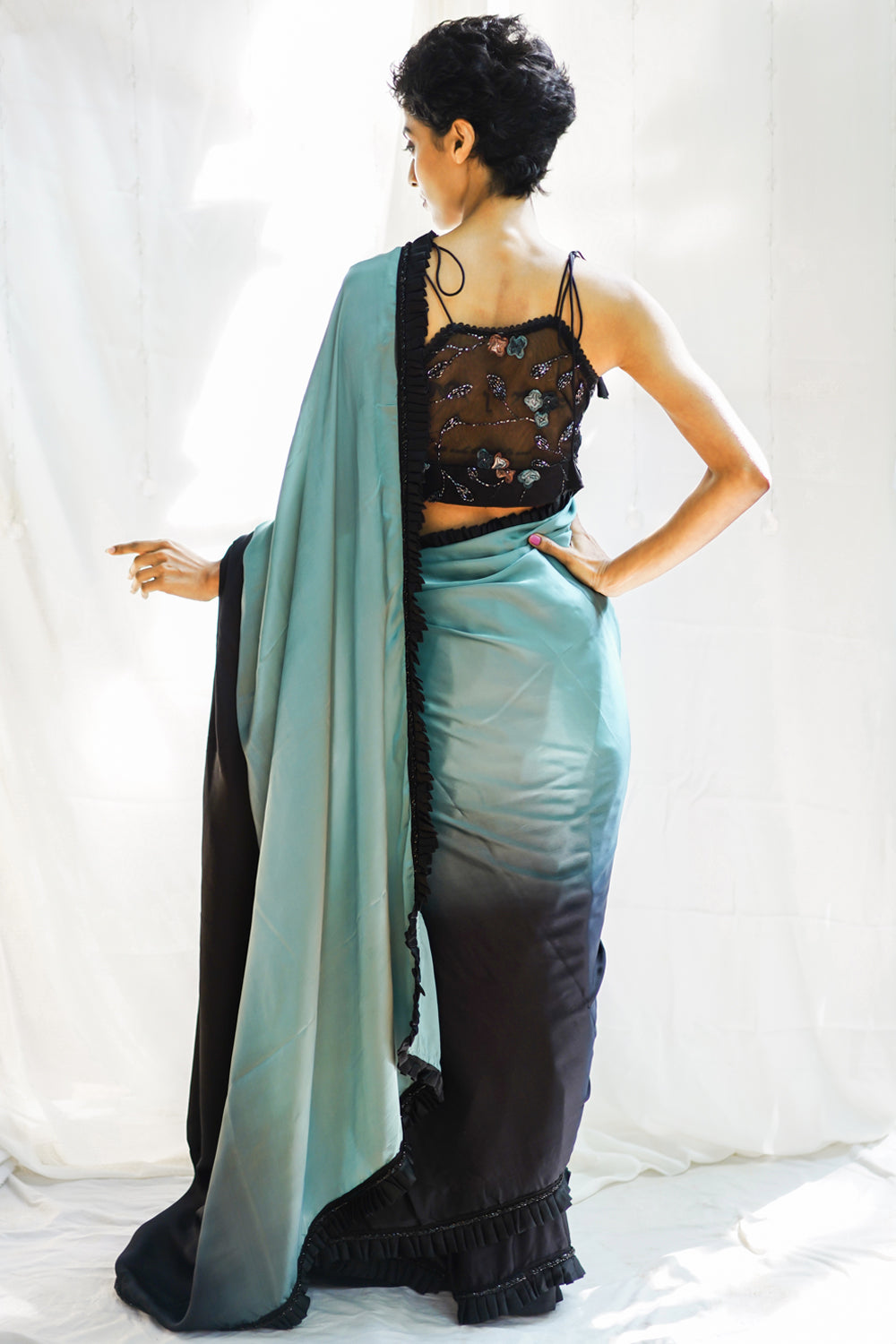 Black and greyish blue shaded pure satin saree with frills and black beads border - House of Blouse