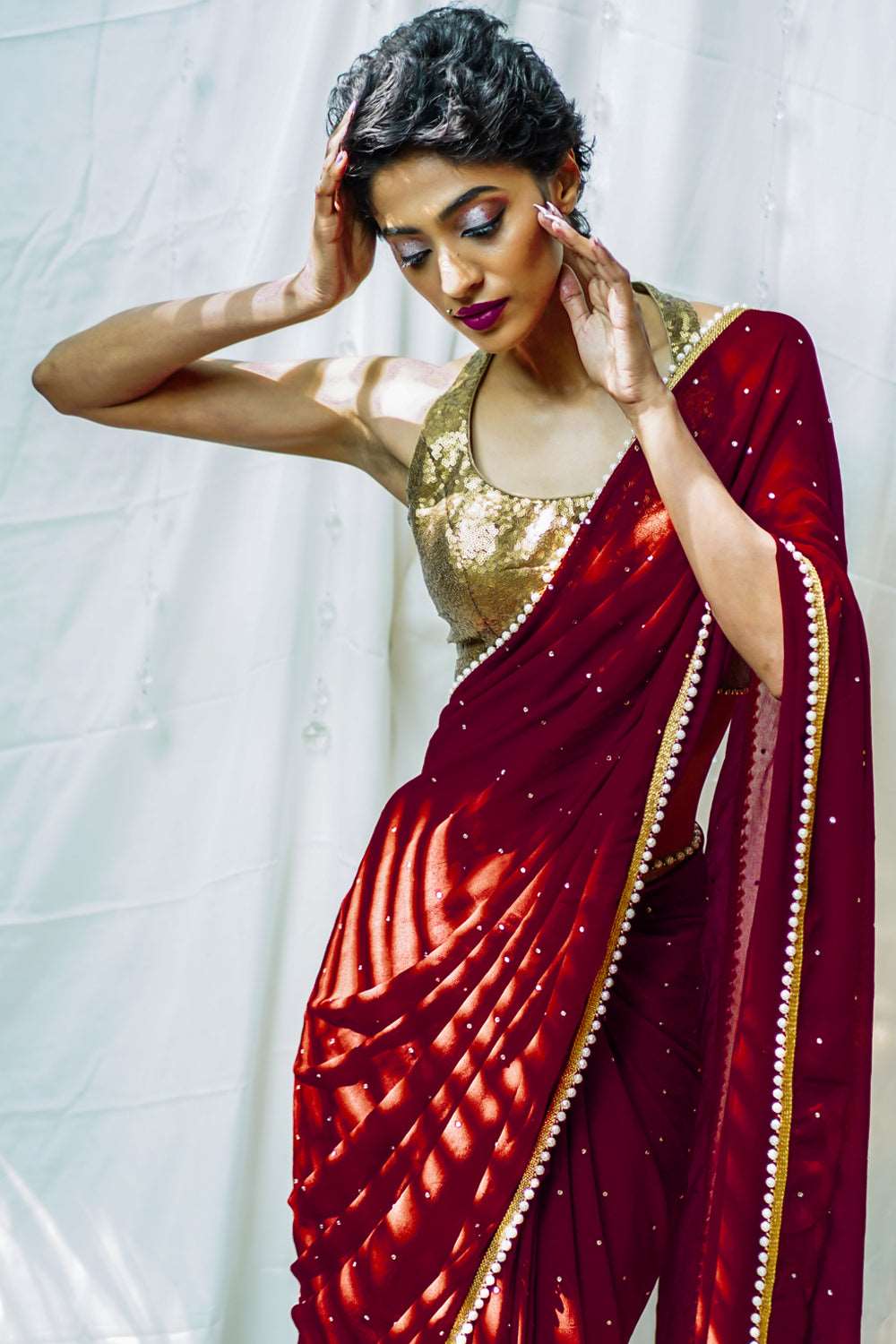 Deep red georgette saree with stone work and and pearl edging - House of Blouse