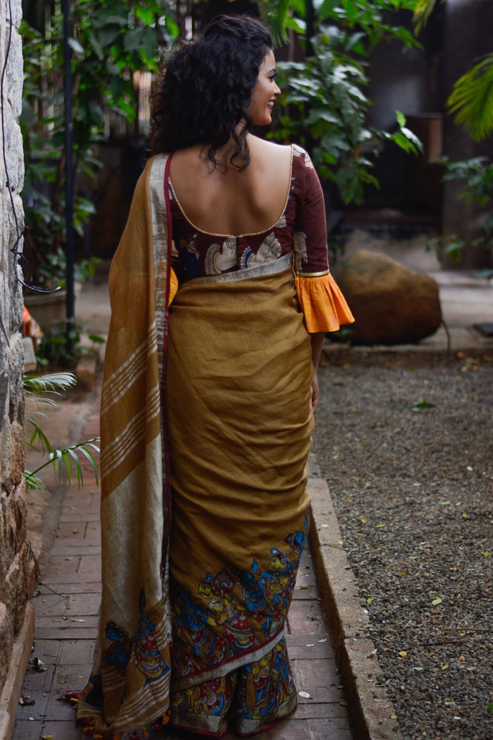 Brown Handwoven linen saree with silver border and Kalamkari applique