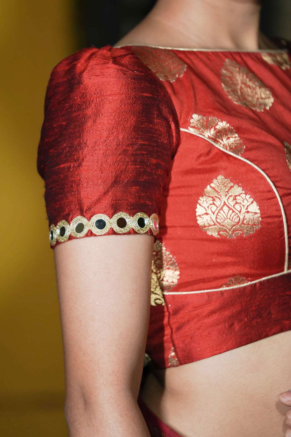 Crimson brocade blouse with raw silk sleeves and back detailing