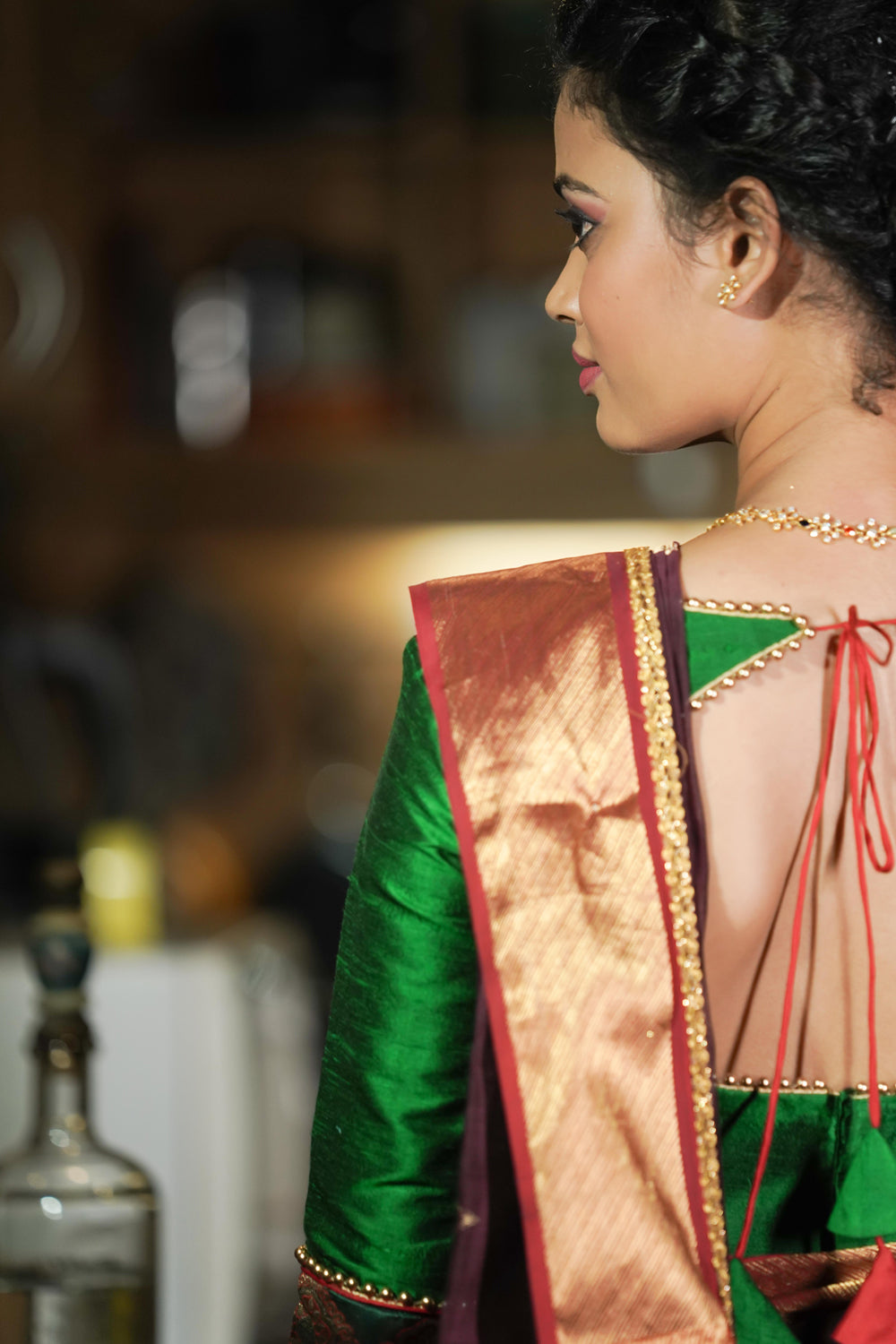 Wine coloured maheshwari silk saree with gold red zari border
