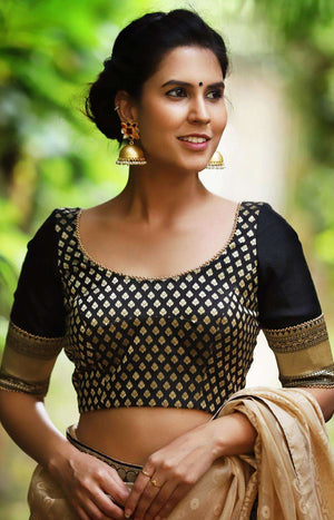 Black and gold brocade blouse with raw silk sleeves and gold bead edgi
