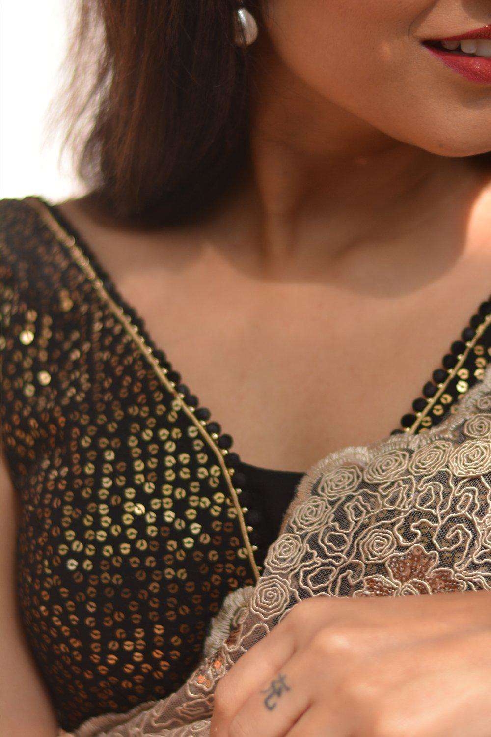 Black and gold sequin embroidered georgette V neck blouse with pompom edging - House of Blouse