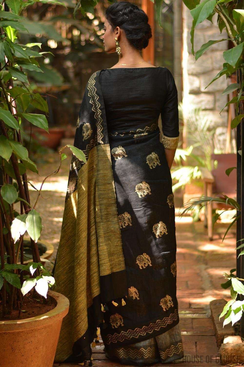 Black and grey half and half linen saree with gold block print and Gitcha pallu - House of Blouse