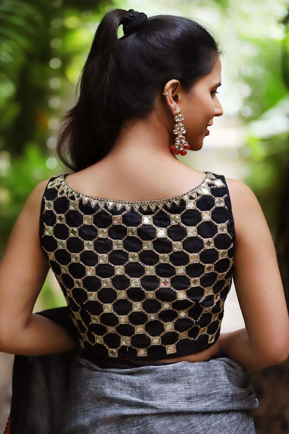 Black raw silk boatneck sleevless blouse with rich mirror and bead embroidery - House of Blouse