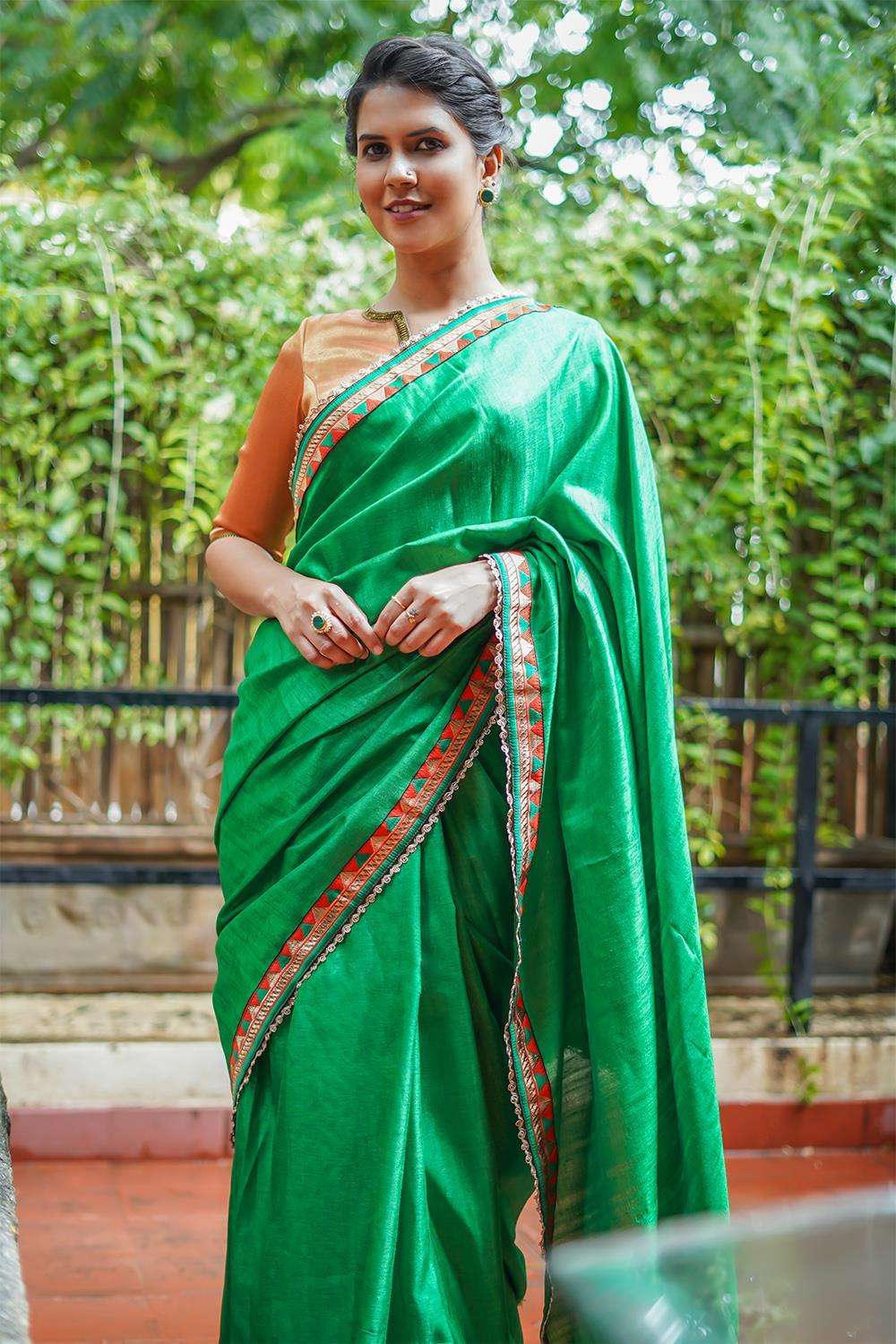 Fern green semi matka silk saree with orange-green geometric border - House of Blouse