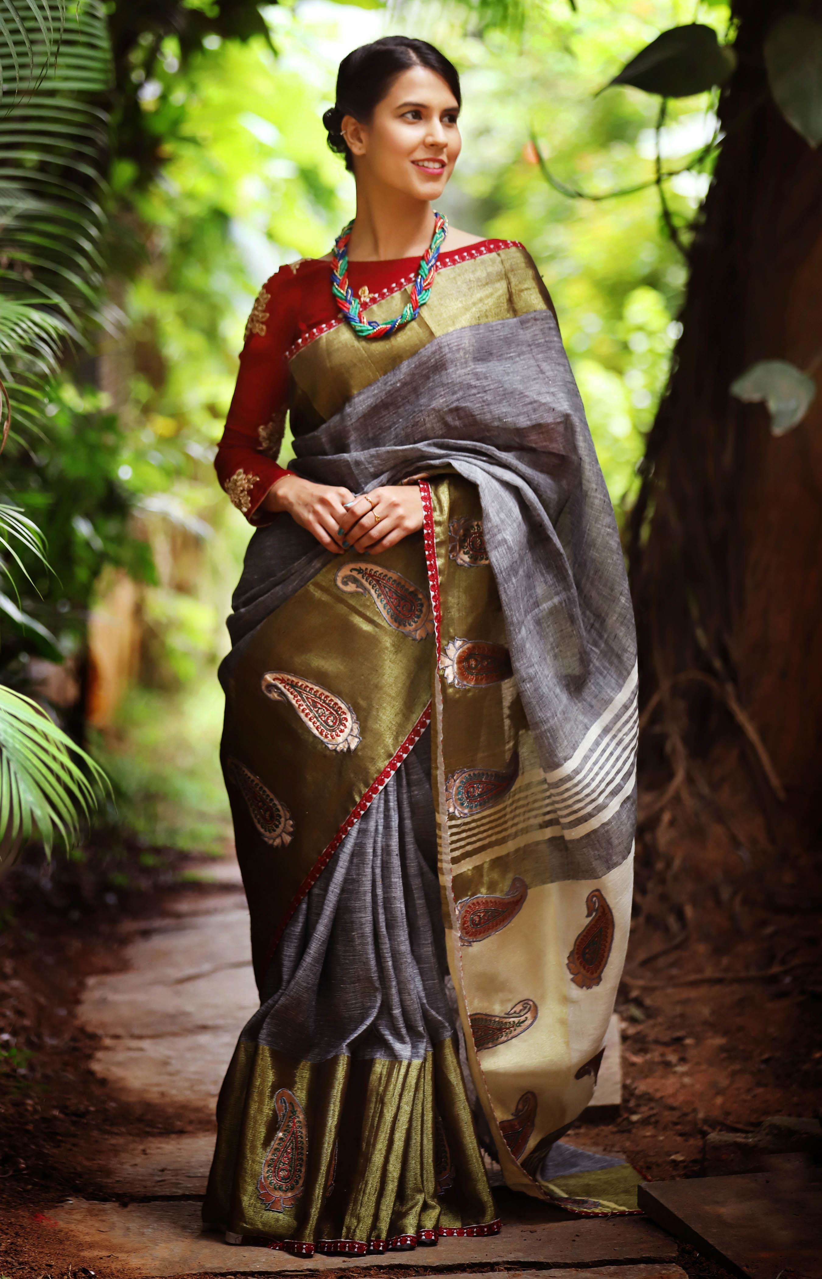 Grey Linen saree with tissue border with Paisley appliques - House of Blouse