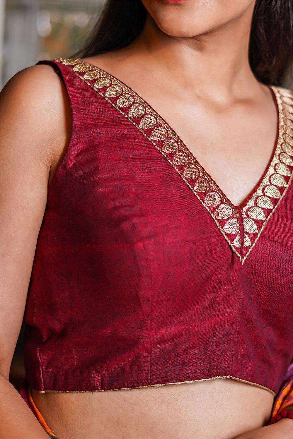 Maroon Khadi cotton V neck sleeveless blouse with maroon zari border - House of Blouse