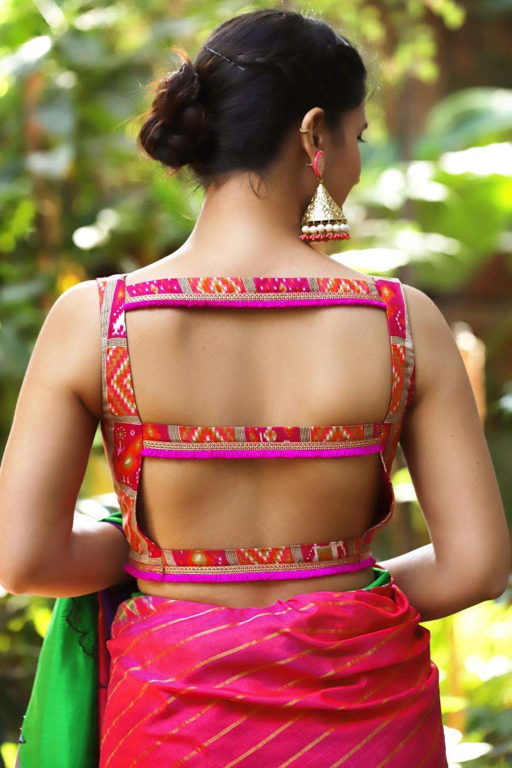 Pink and orange checked Ikat printed semi silk boatneck blouse with back detailing - House of Blouse