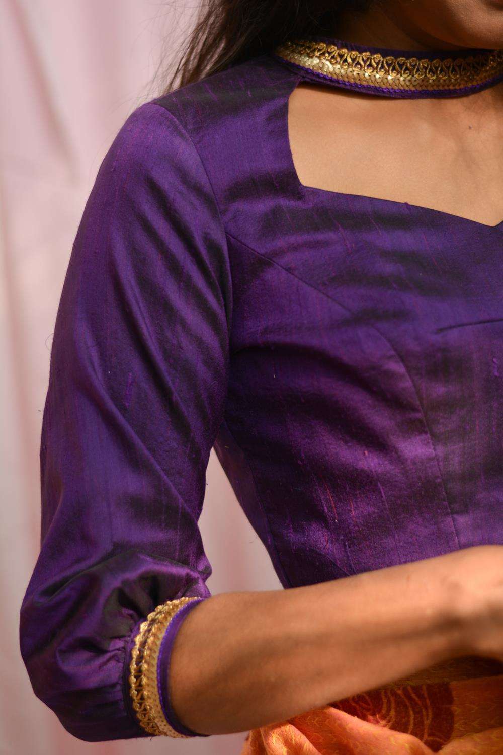 Purple raw silk hi neck blouse with puff sleeves and border detailing - House of Blouse