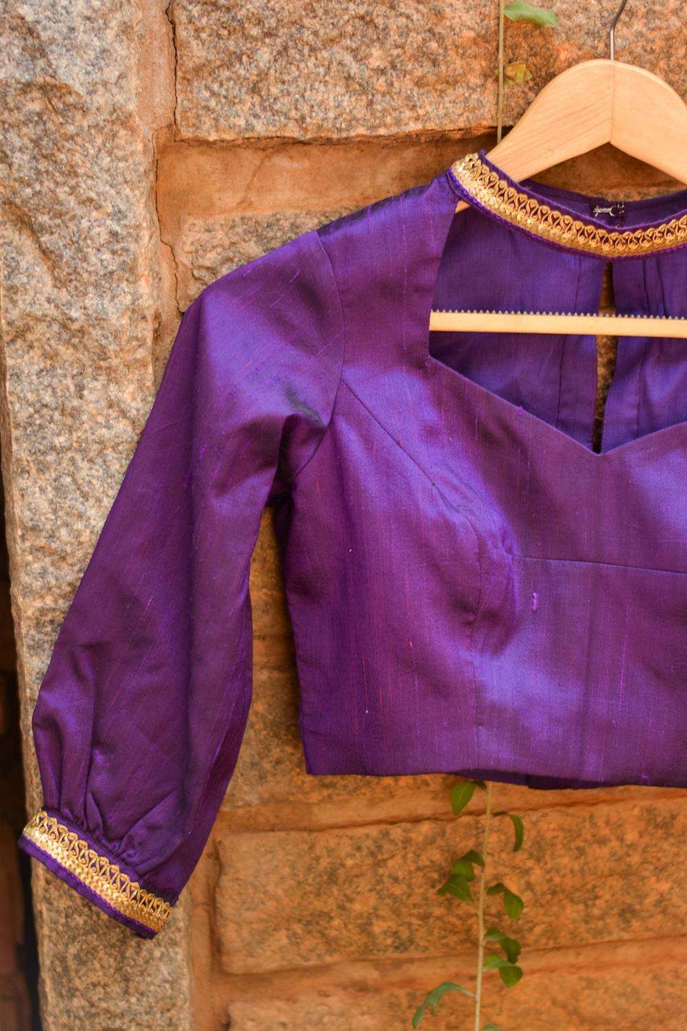 Purple raw silk hi neck blouse with puff sleeves and border detailing - House of Blouse