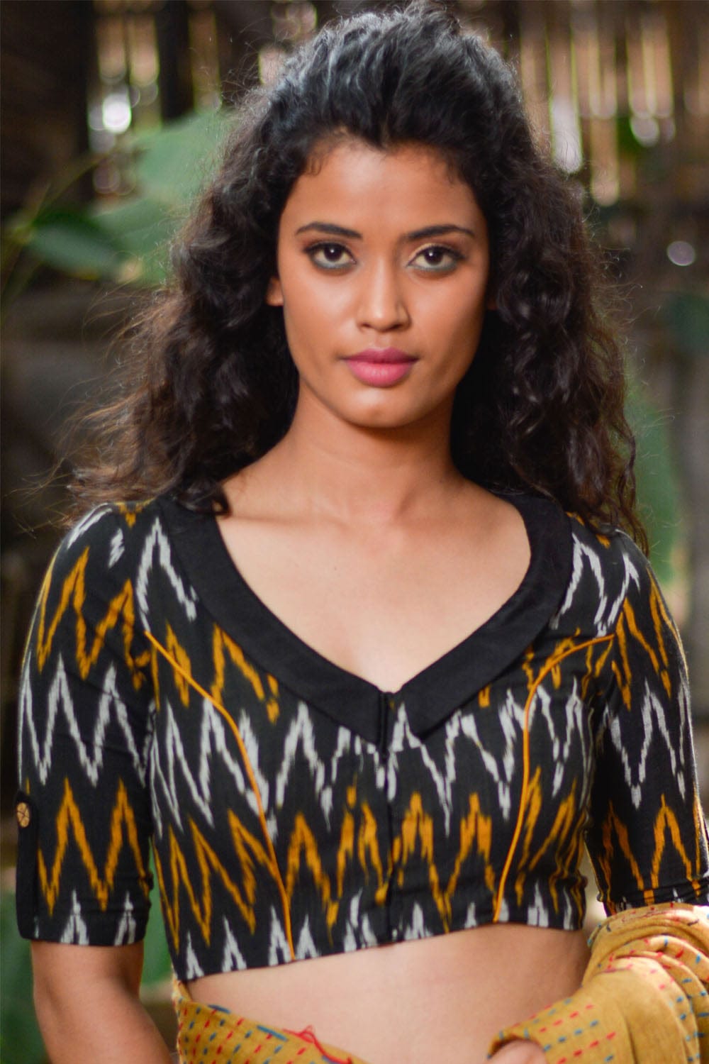 Black and mustard ikat cotton V neck collared blouse with cuff detailing