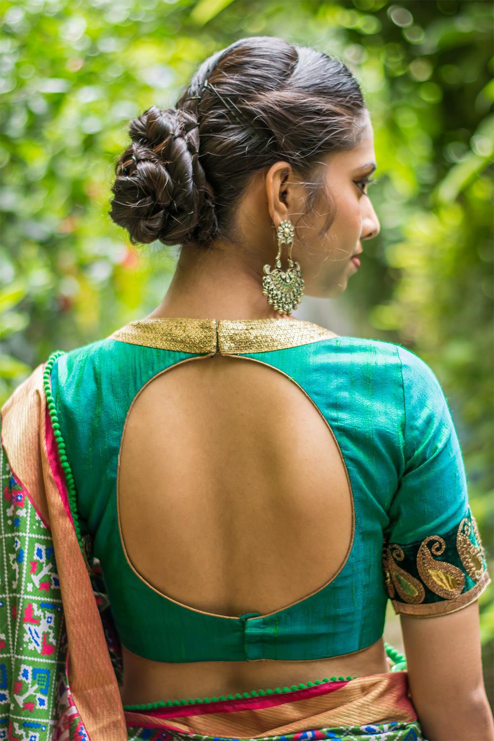 Green raw silk round neck blouse with border detailing - House of Blouse