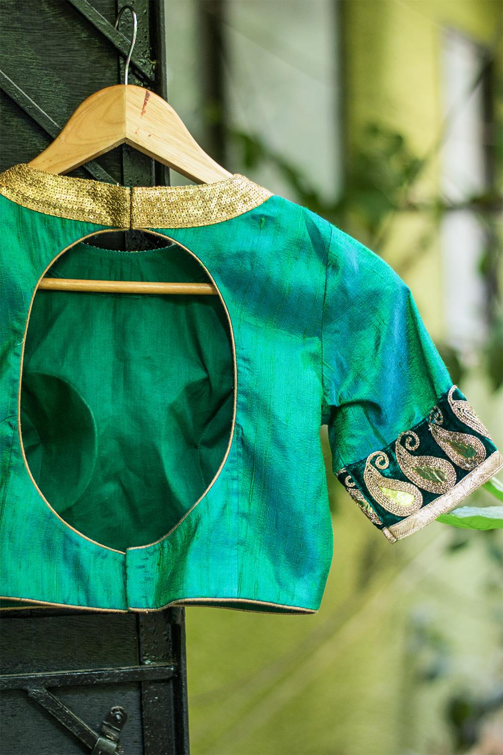 Green raw silk round neck blouse with border detailing - House of Blouse