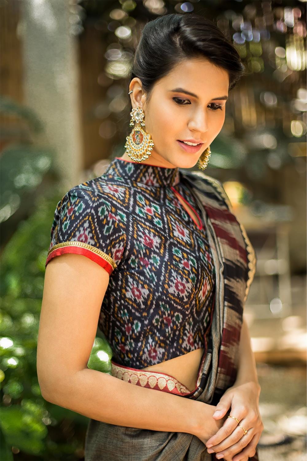 Midnight blue Ikat cotton silk hi neck blouse with an embellished back