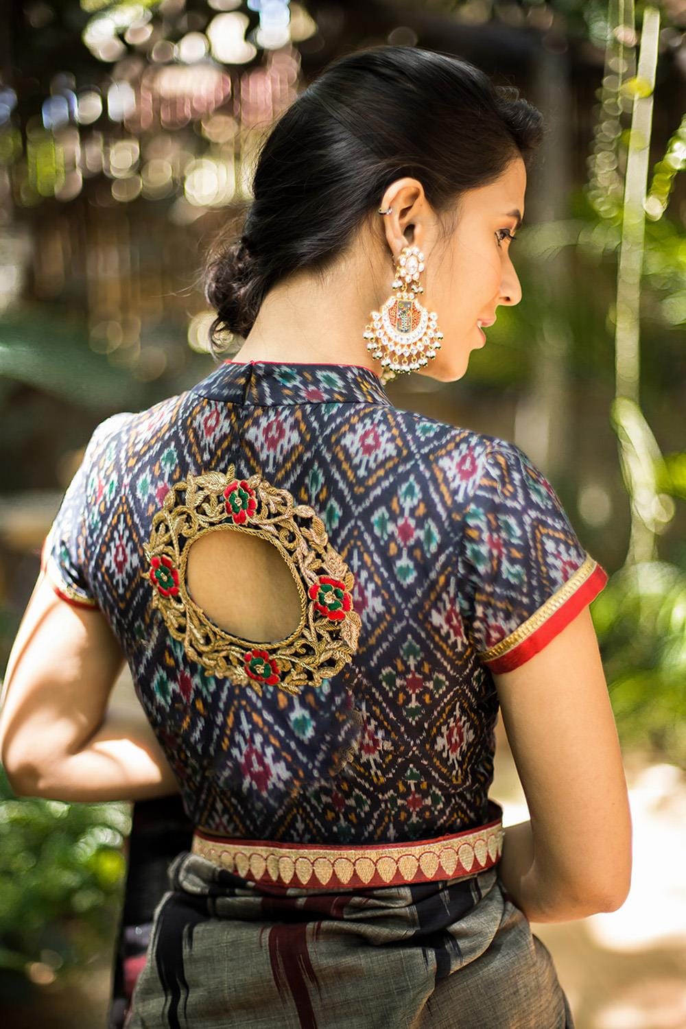 Midnight blue Ikat cotton silk hi neck blouse with an embellished back