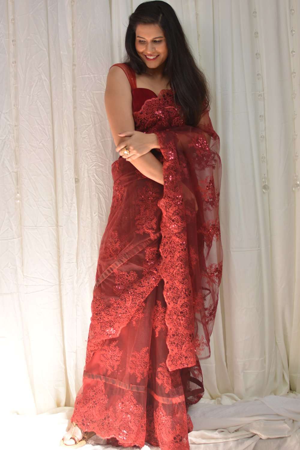 Red net saree with lacy self-coloured threadwork - House of Blouse