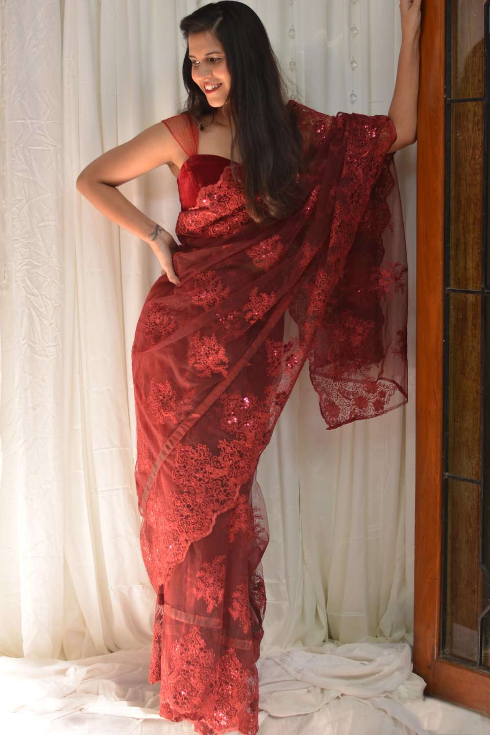 Red net saree with lacy self-coloured threadwork - House of Blouse