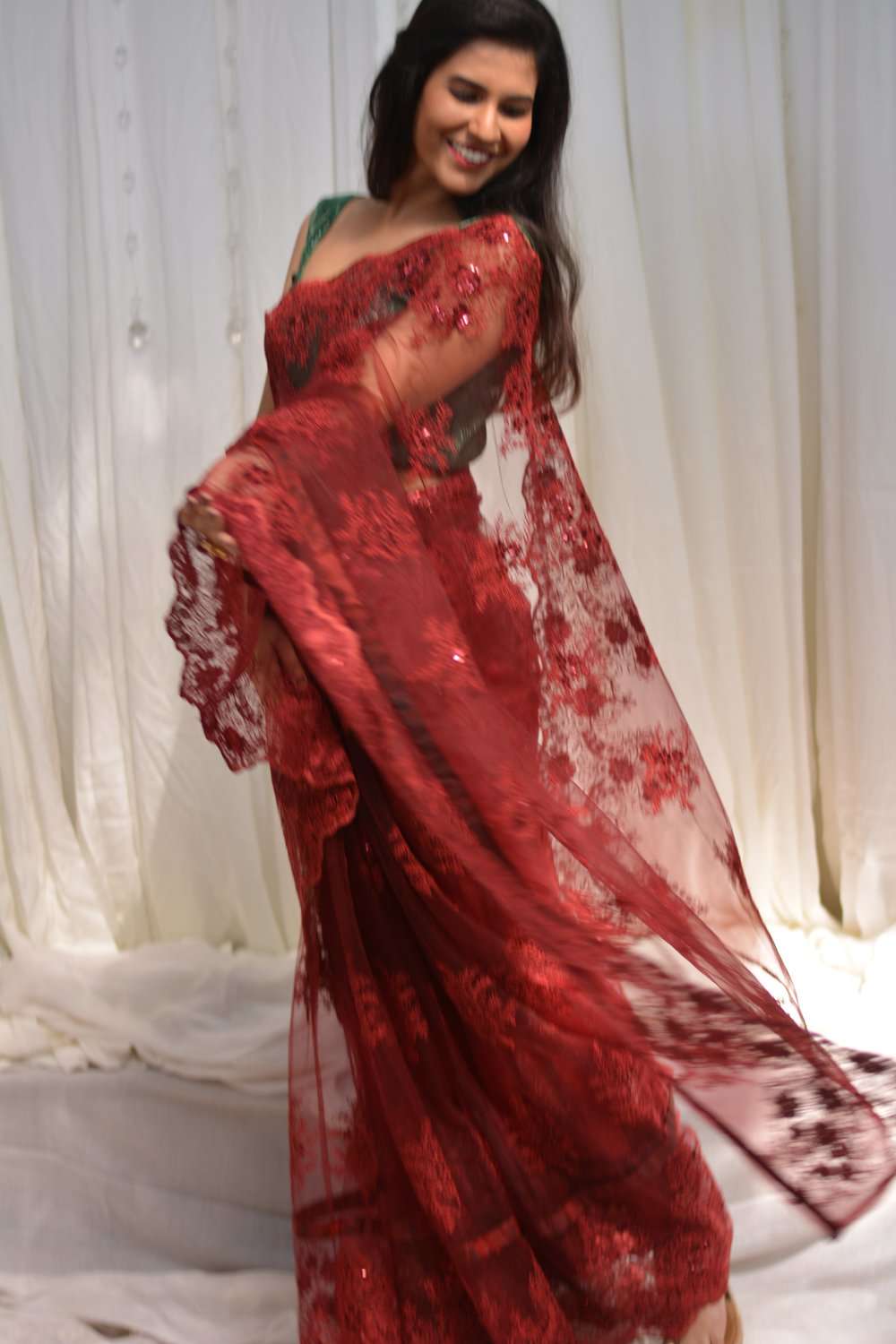 Red net saree with lacy self-coloured threadwork - House of Blouse