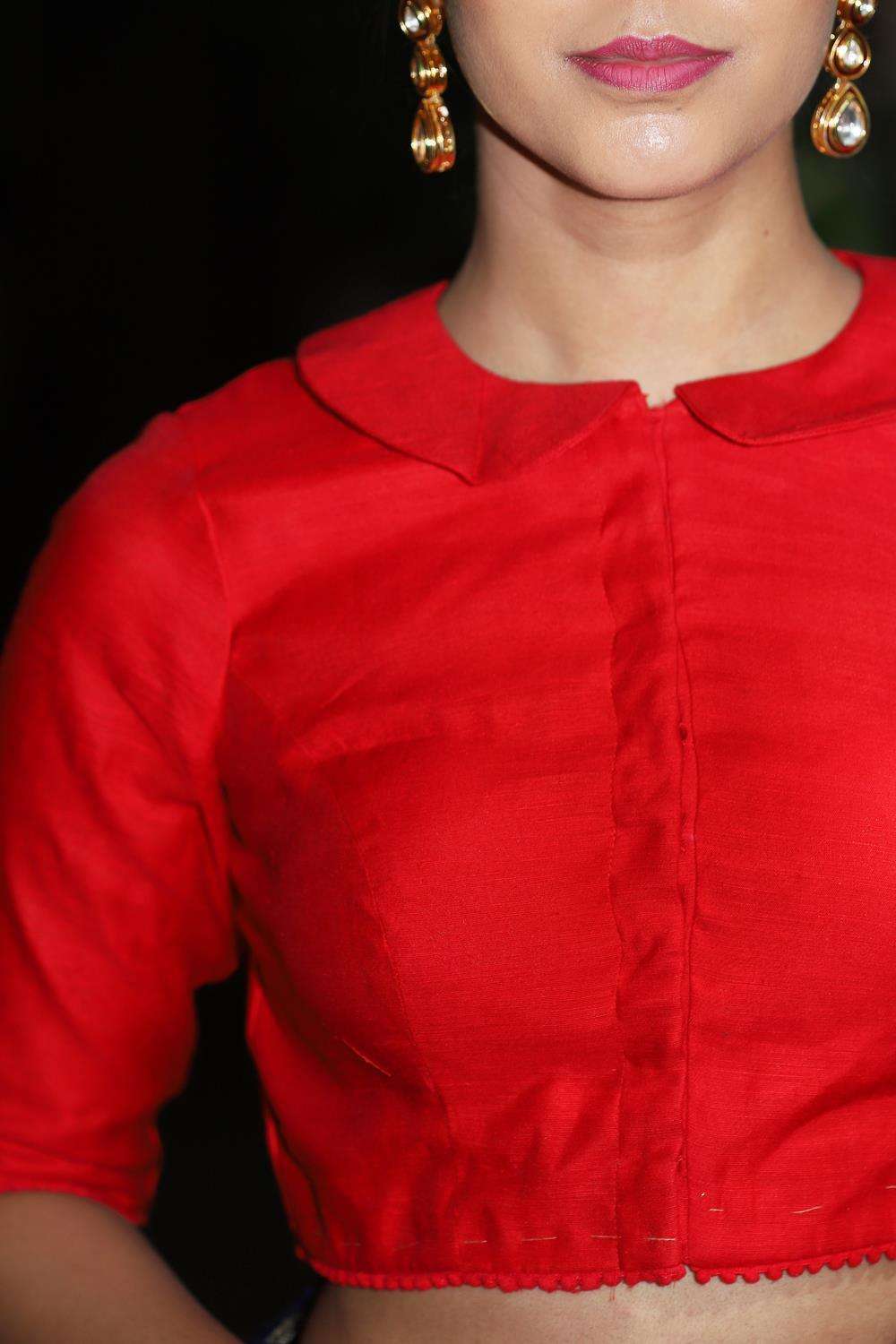Red spun silk blouse with peter pan collar and pompom detailing - House of Blouse