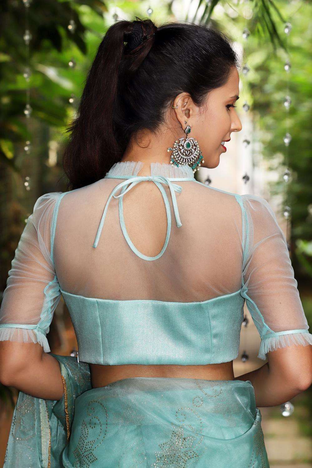 Sea green shimmer georgette and net sheer yoke blouse with frill detailing - House of Blouse