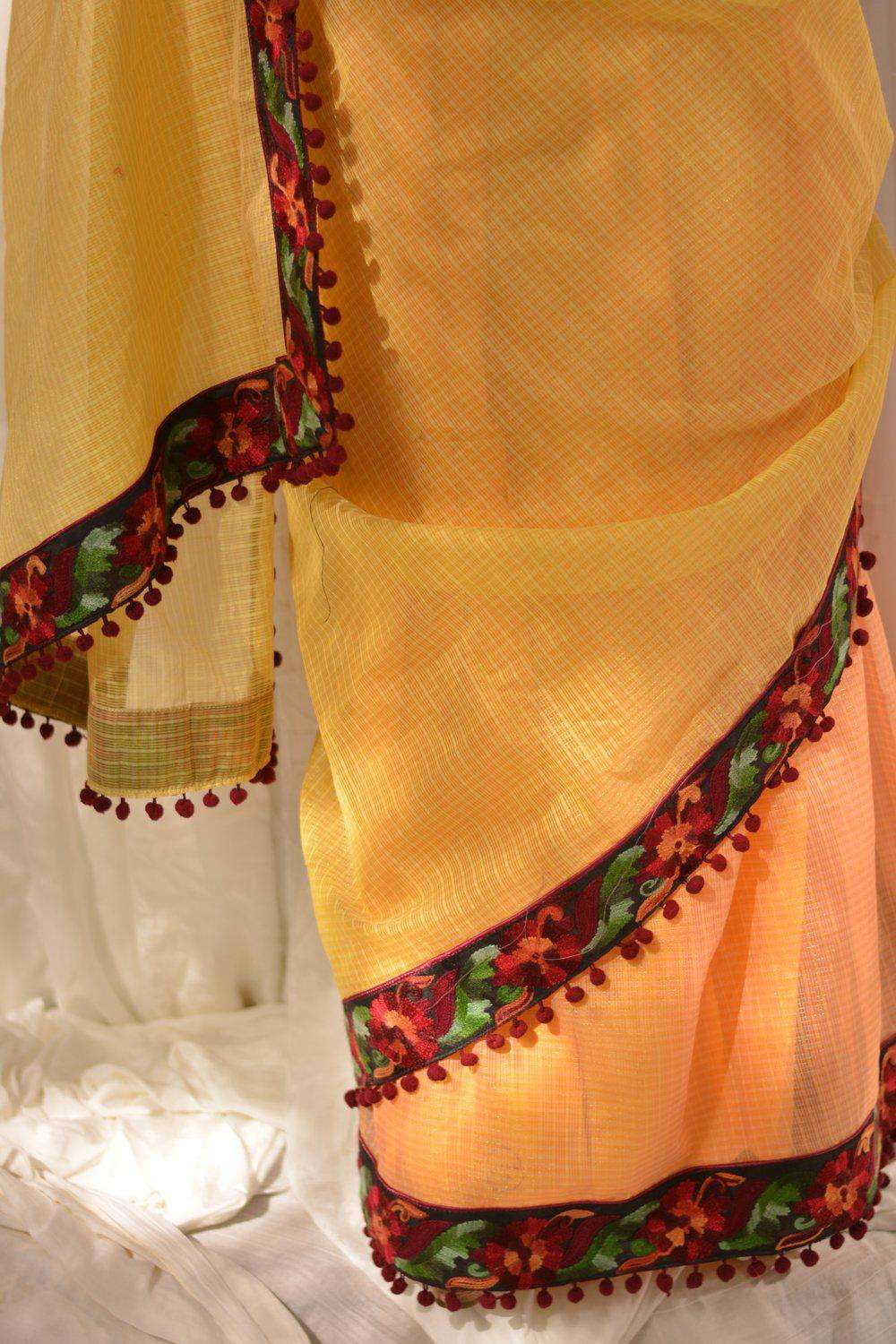 Yellow and orange half and half Kota doria saree with maroon threadwork border and pom pom edging - House of Blouse